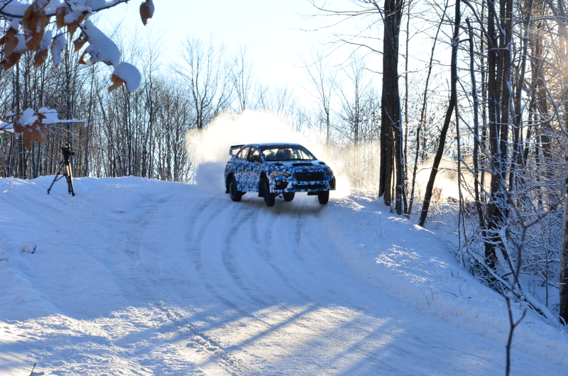 Illustration for article titled Watch The 2015 Subaru WRX STI Rally Car Catch Air Sideways